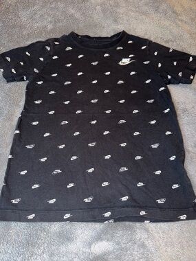 Nike Black T-Shirt with White Mini Swoosh Pattern